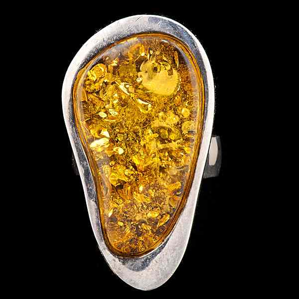 Appraisal: Sterling Silver and Amber Cocktail Ring A modern style bezel-set