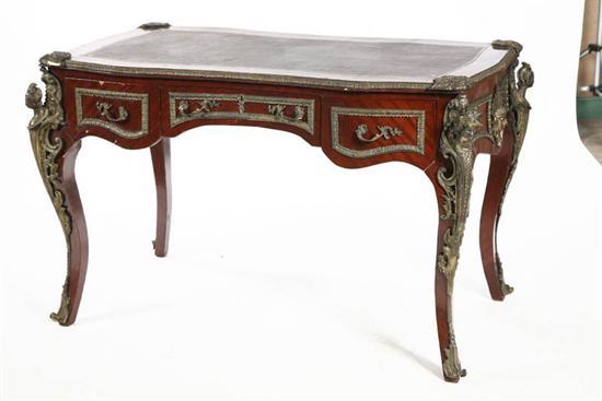 Appraisal: FRENCH STYLE DESK Veneered with a leather top three drawers