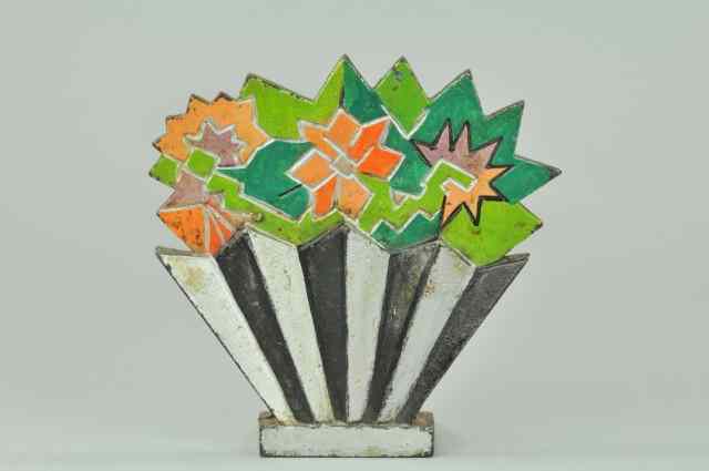 Appraisal: MIXED FLOWERS IN DECO VASE DOORSTOP BOOK EXAMPLE fantastic deco