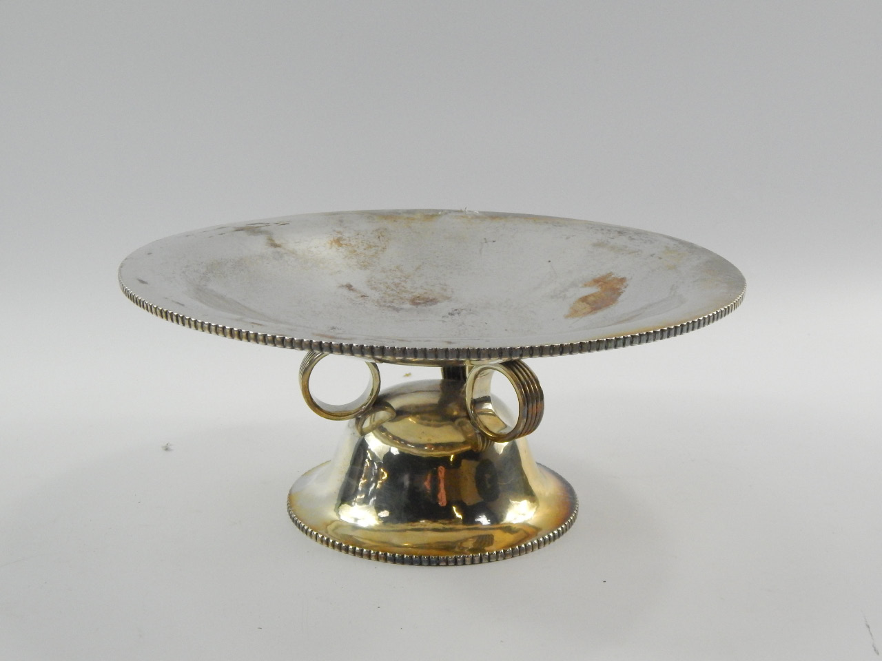 Appraisal: A George VI Art Deco silver tazze the top with