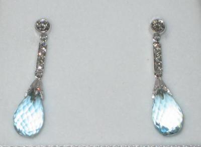 Appraisal: A PAIR OF DIAMOND AND AQUAMARINE EARRINGS comprising brilliant cut