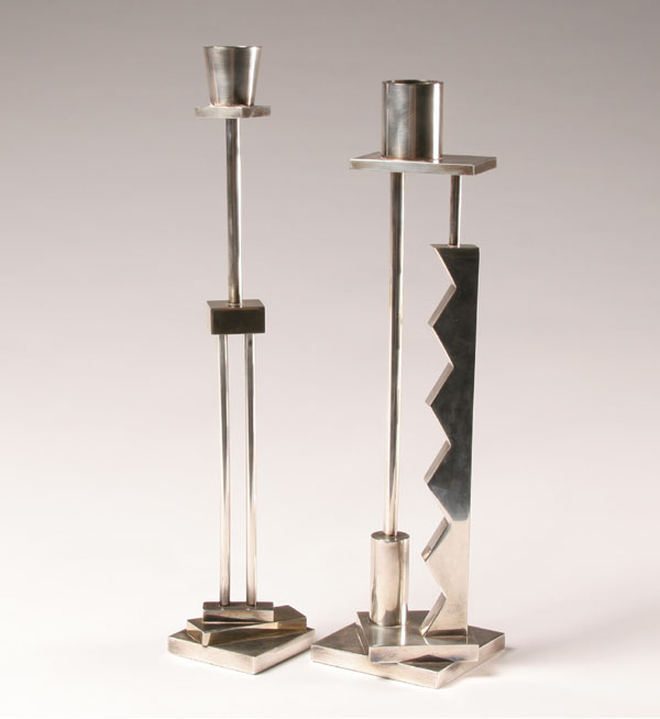 Appraisal: E Sottsass Italian silverplate geometric candlesticks for Memphis Tallest H