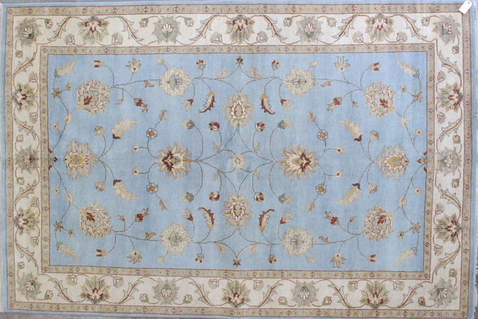 Appraisal: HAND KNOTTED ORIENTAL CARPET Indo-Persian floral Isfahan design on sky