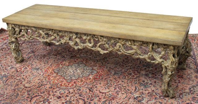 Appraisal: Contemporary coffee table late th c plank top over root-form