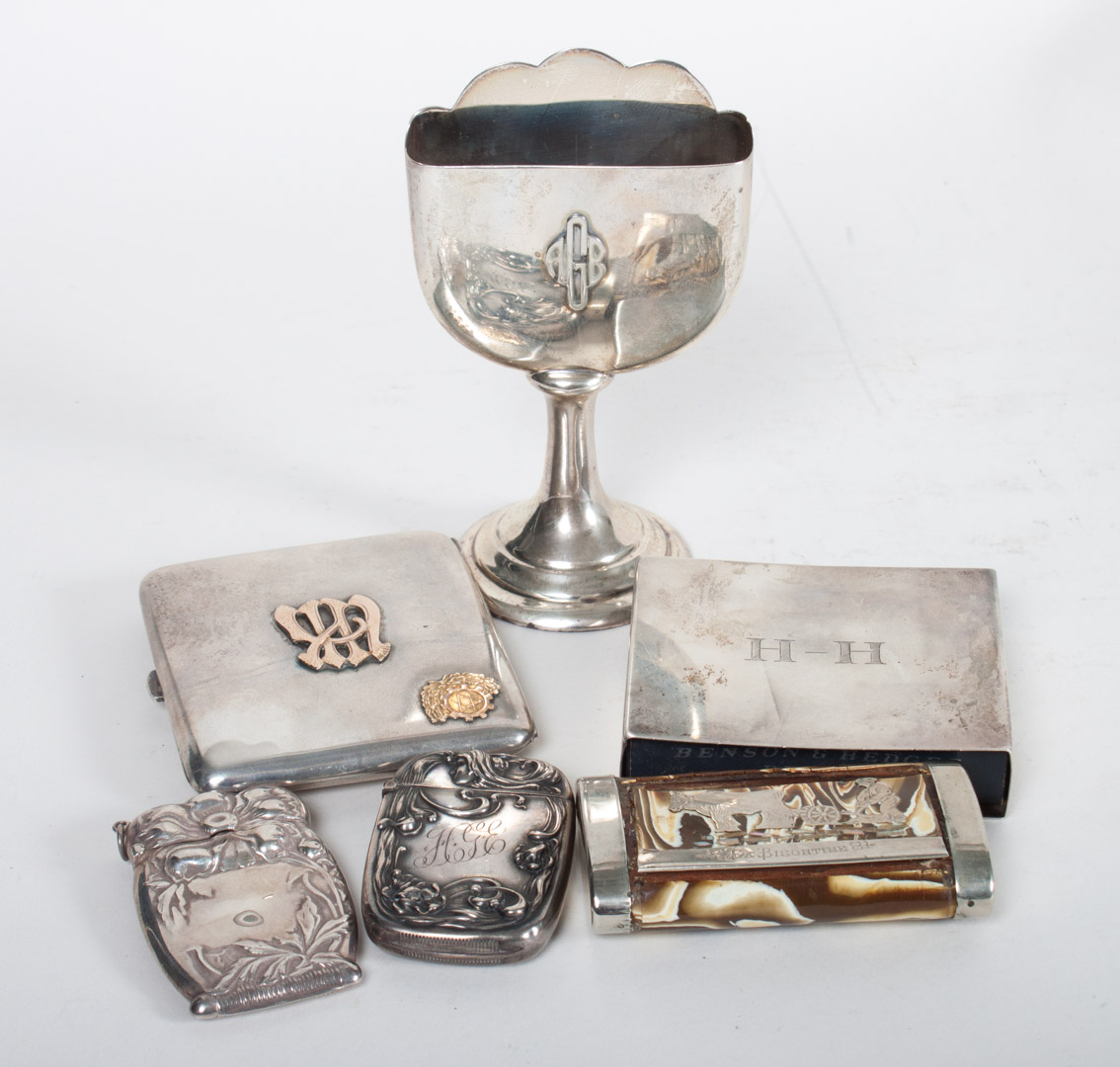 Appraisal: Assortment of silver smoker's paraphernalia including Swedish silver gold cigarette