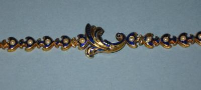 Appraisal: A VICTORIAN ENAMEL AND PEARL BRACELET each link modelled as