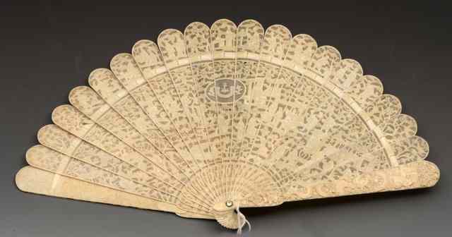 Appraisal: A CANTON CARVED BRISE IVORY FAN decorated allover with figures