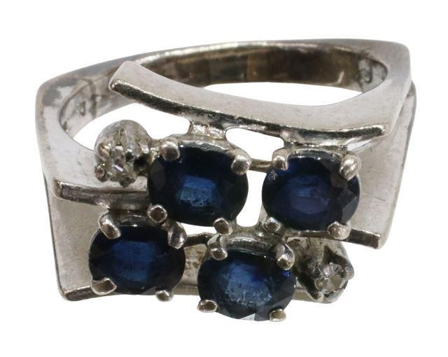 Appraisal: Estate modernist kt white gold ring with four oval-cut blue