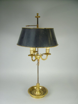 Appraisal: A French gilt bronze adjustable three light candlestick late th