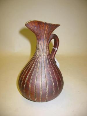 Appraisal: A STONEWARE EWER by Waistel Cooper of onion form with