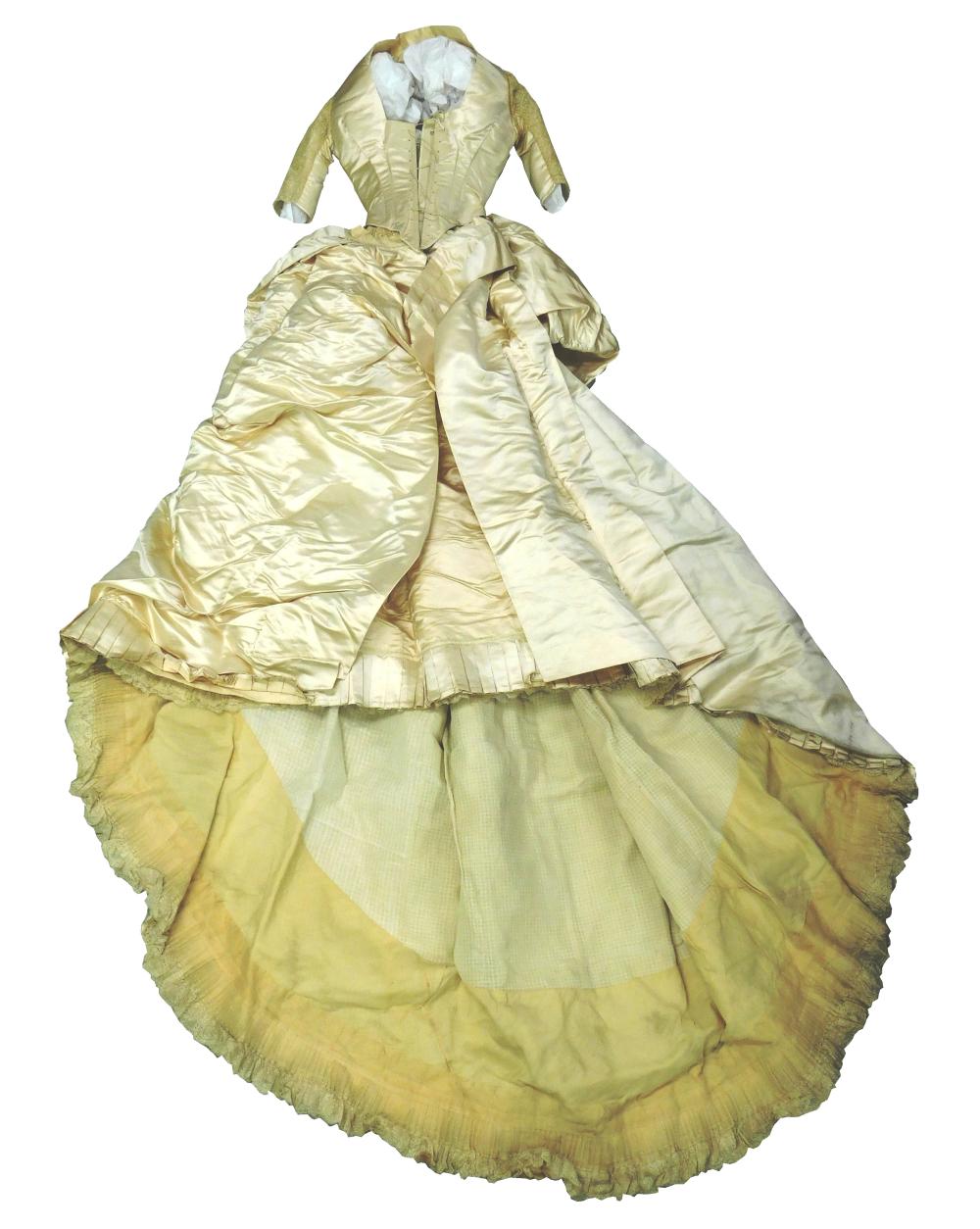 Appraisal: Victorian wedding dress white satin with lace trim c museum