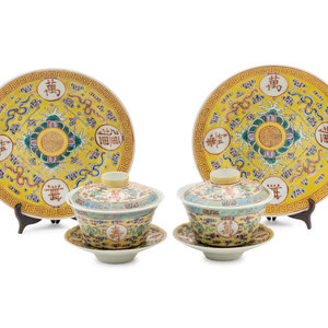 Appraisal: A Set of Four Chinese Famille Jaune Porcelain Tea Services