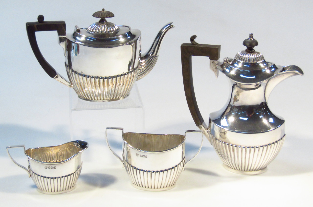 Appraisal: A Victorian silver three piece bachelor's tea service comprising of