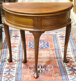 Appraisal: Queen Anne style demilune games table the hinged top opening