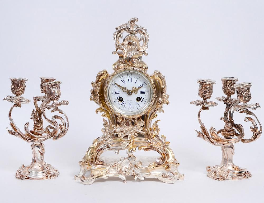 Appraisal: LOUIS XV STYLE SILVERED BRONZE GARNITURE Circa Comprised of a