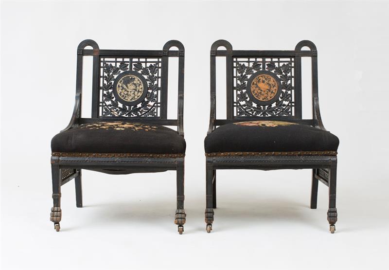 Appraisal: POTTIER STYMUS ATTRIBUTION PAIR OF PARLOR CHAIRS Ebonized finish pierced