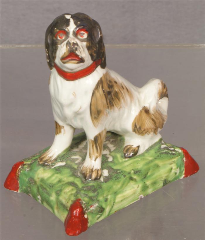 Appraisal: Miniature Staffordshire double spaniel figurine h Estimate -