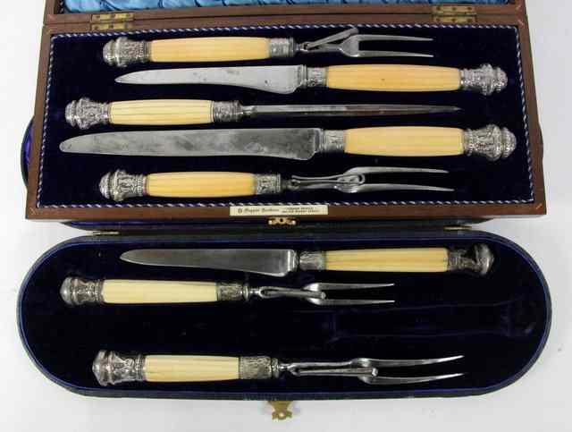 Appraisal: A carving knife and two forks with ivory handles and