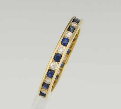 Appraisal: A Ladies' Sapphire and Diamond Eternity Band k yellow gold