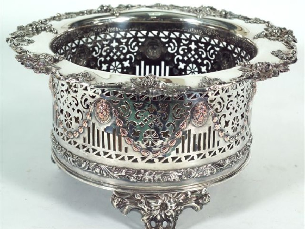 Appraisal: EDWARDIAN SILVER-PLATED JARDINIERE with vine and grape-cast rim above a