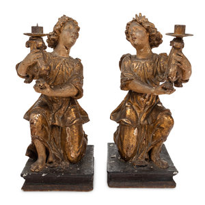 Appraisal: A Pair of Continental Giltwood Figural Altar Candlesticks th Century