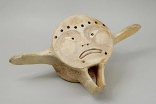 Appraisal: Inuit Carved Inlaid Whalebone Vertebra Sculpture Inuit carved and inlaid