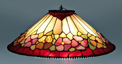 Appraisal: Hanging stained glass shade geometric designs with red and lavender