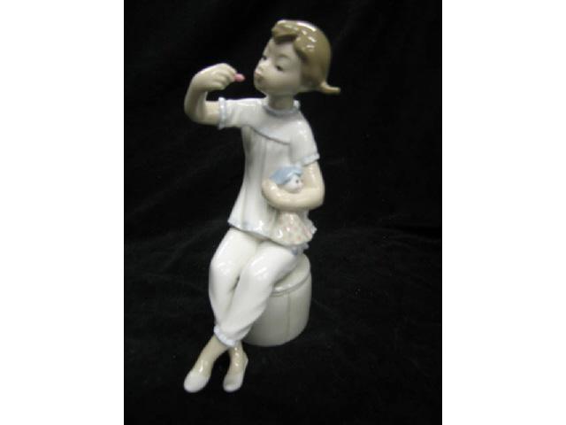 Appraisal: Lladro Porcelain Figurine Girl with Doll retired