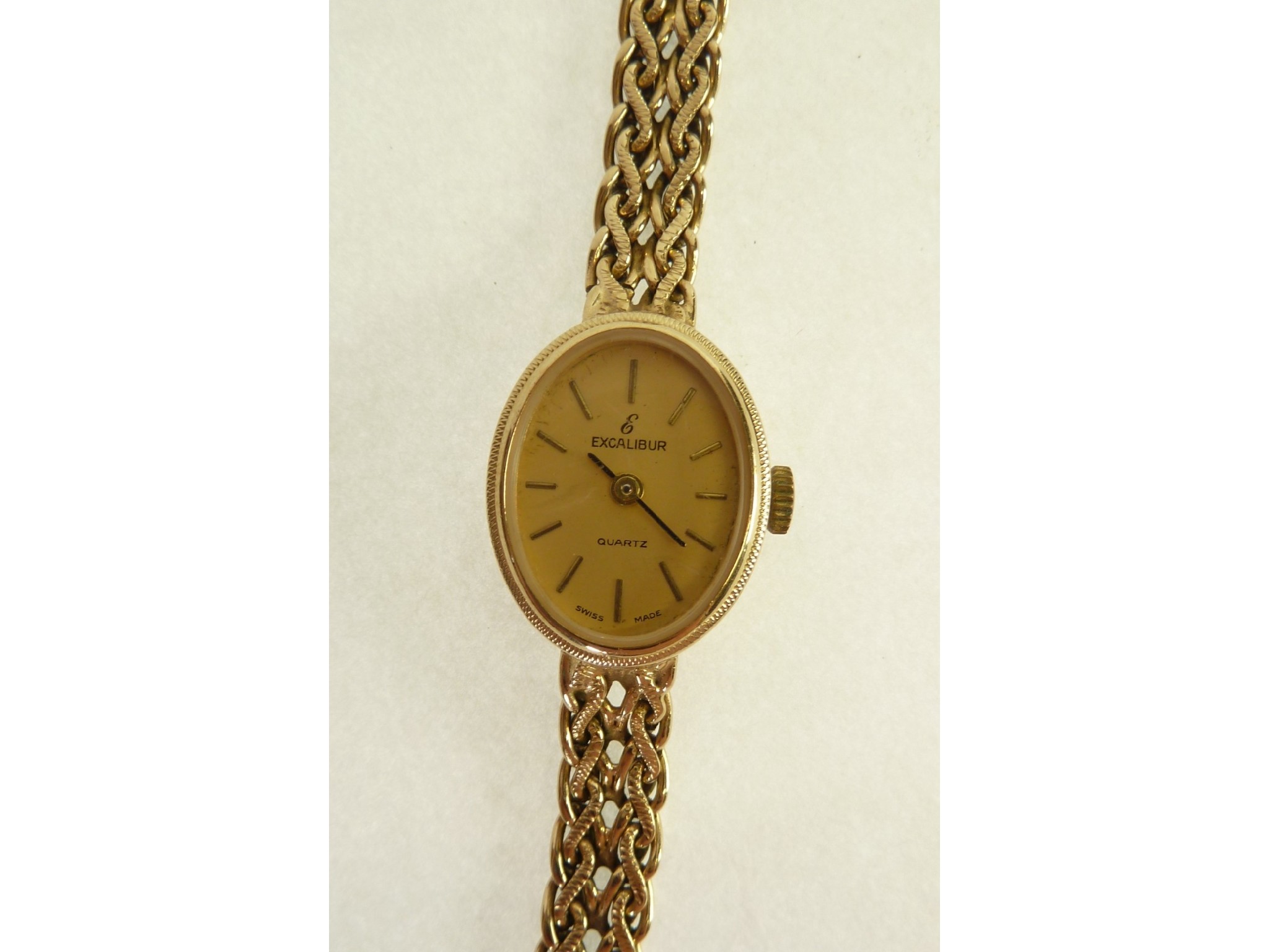 Appraisal: LADY'S CT GOLD EXCALIBUR QUARTZ WRIST WATCH oval gilt dial