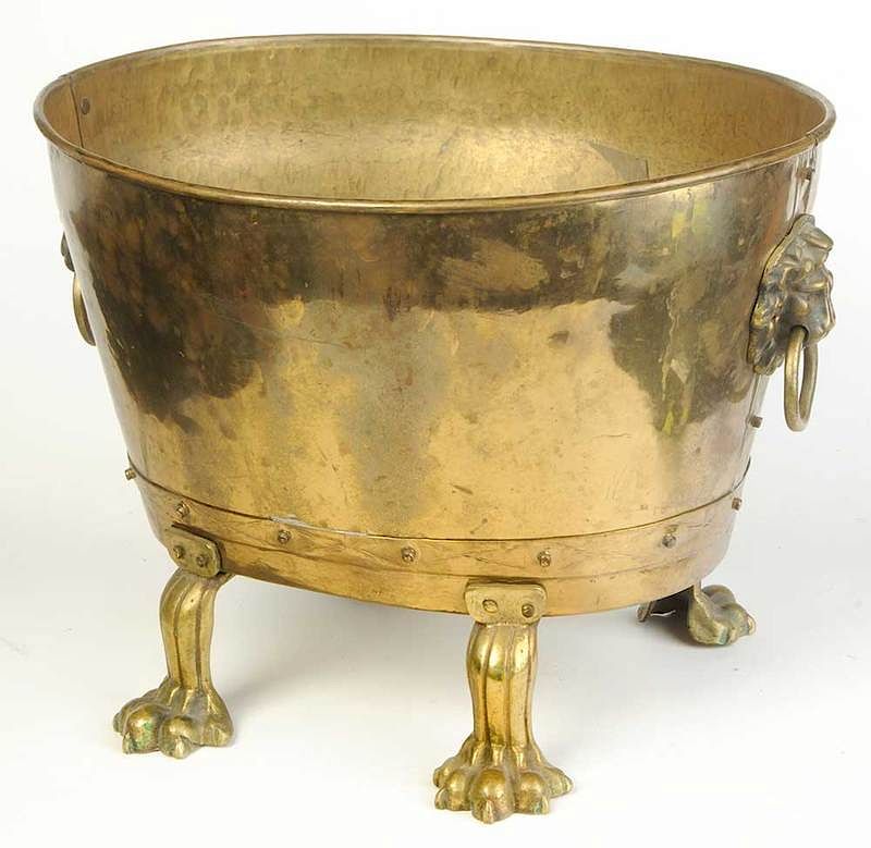 Appraisal: Regency Style Brass Kindling Bucket British th century lion-masked handles