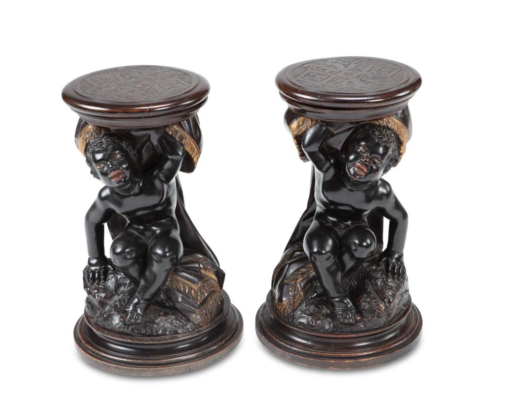 Appraisal: A pair of Continental carved wood figural pedestals Fourth-Quarter th