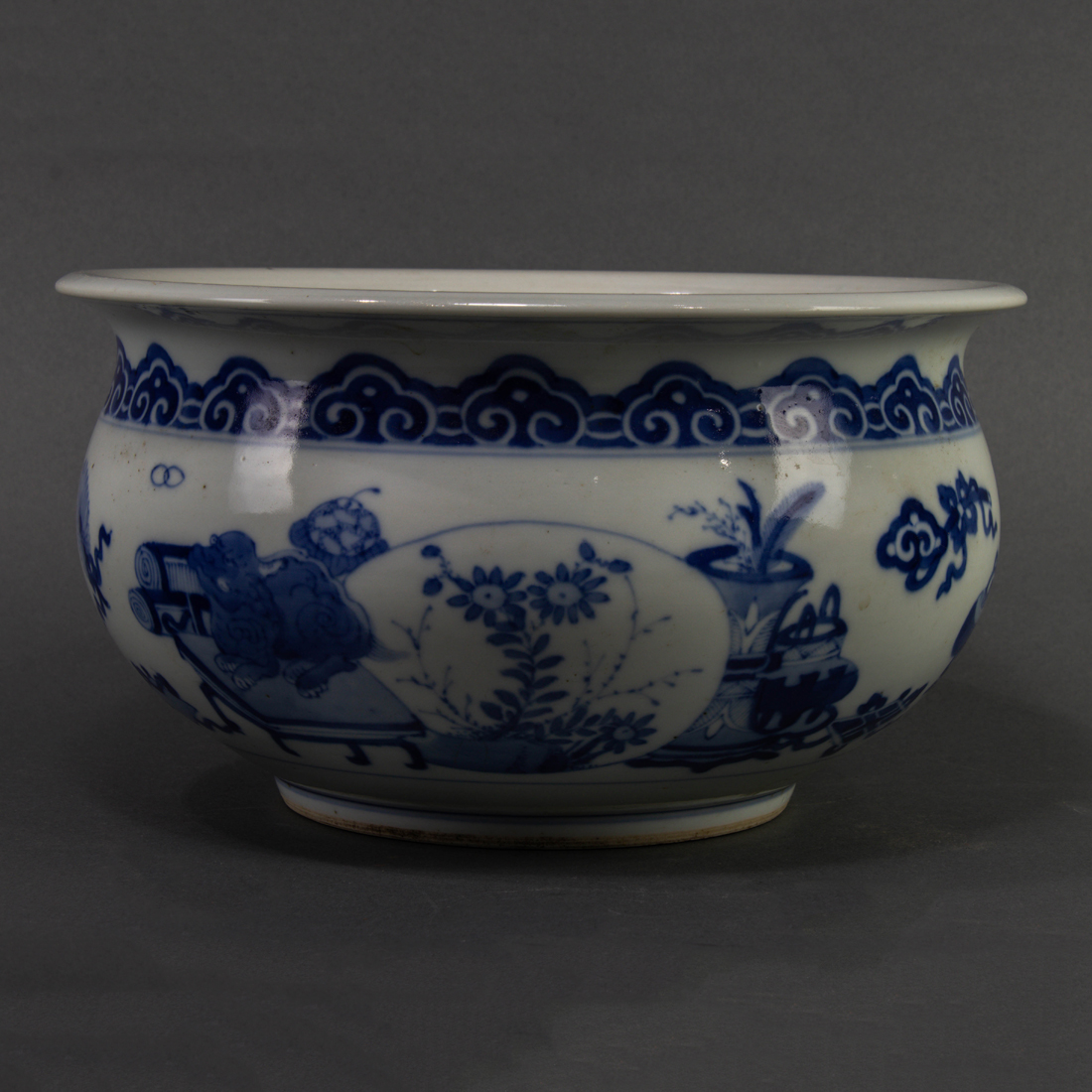 Appraisal: Chinese underglaze blue jardiniere decorated with various antiques and floral