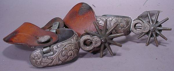 Appraisal: A pair of silver-mounted Mexican spurs owned by Santa Fe