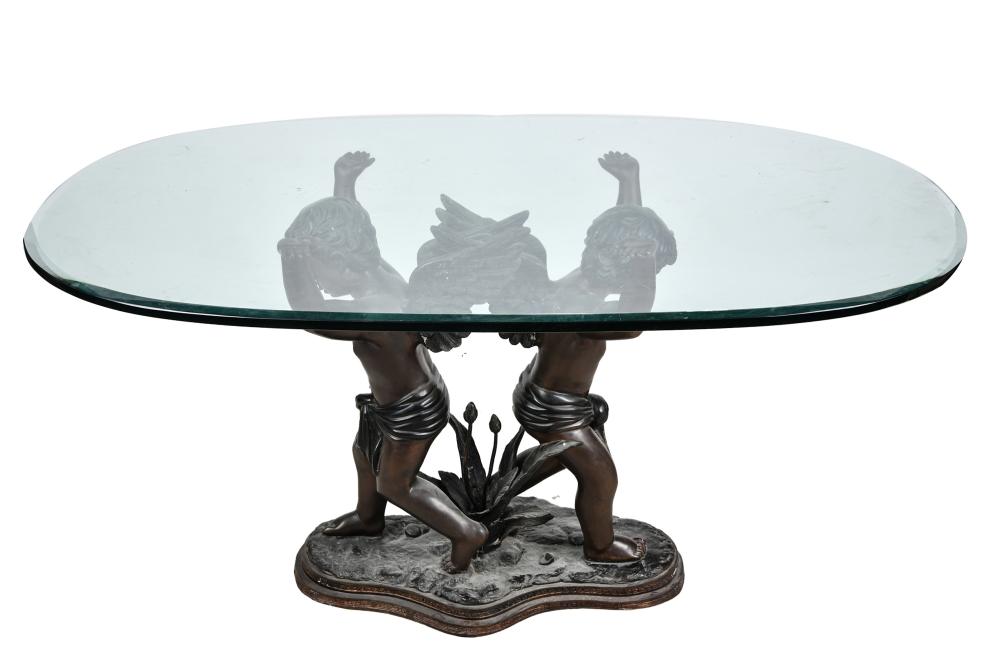 Appraisal: FIGURAL BRONZE CHERUB TABLECondition with light scratches throughout table top