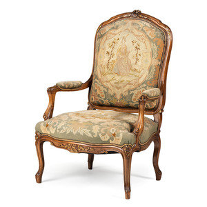 Appraisal: A Louis XV Style Carved Walnut and Needlework Upholstered Fauteuil