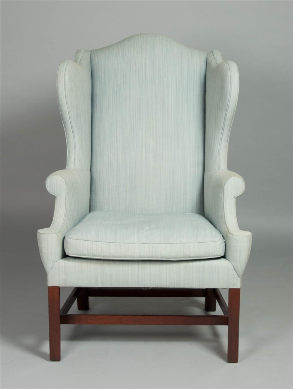 Appraisal: GEORGE III STYLE MAHOGANY UPHOLSTERED WING CHAIR BY KINDEL having