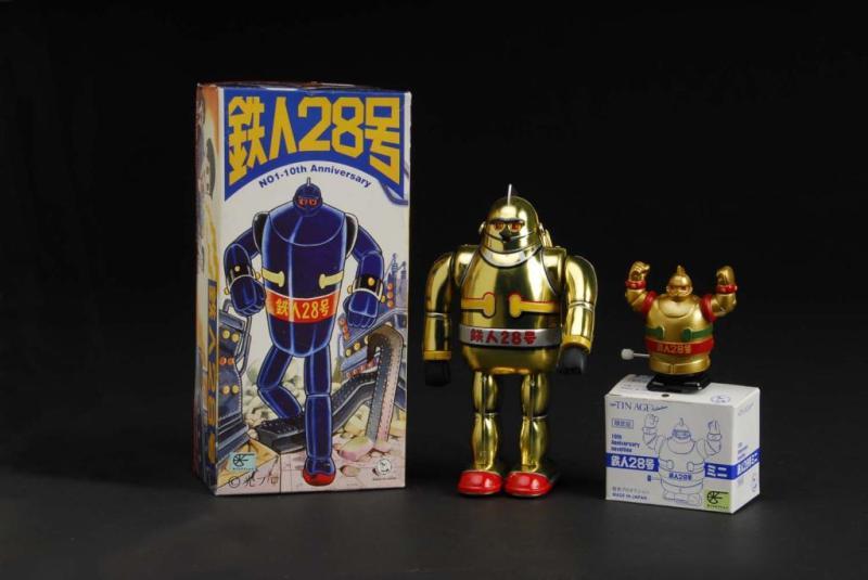 Appraisal: Tin th Anniversary Gigantor Wind-Up Toy Description Japanese Made by