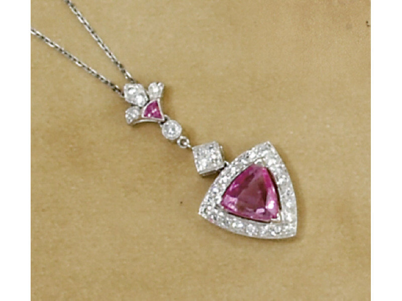 Appraisal: PINK SAPPHIRE AND DIAMOND PENDANT k white gold pendant set