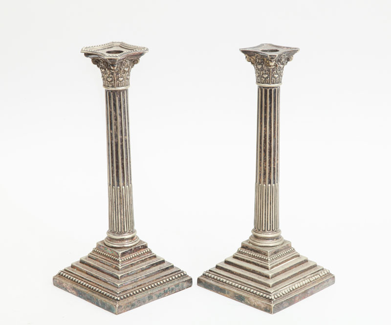 Appraisal: PAIR OF ENGLISH SILVER-PLATED CANDLESTICKS WITH FIVE-LIGHT DISTRESSED CANDELABRA ARMS