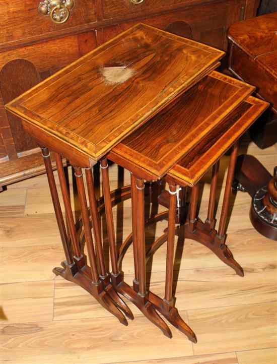 Appraisal: A Regency nest of rosewood quartetto tables with satinwood banded