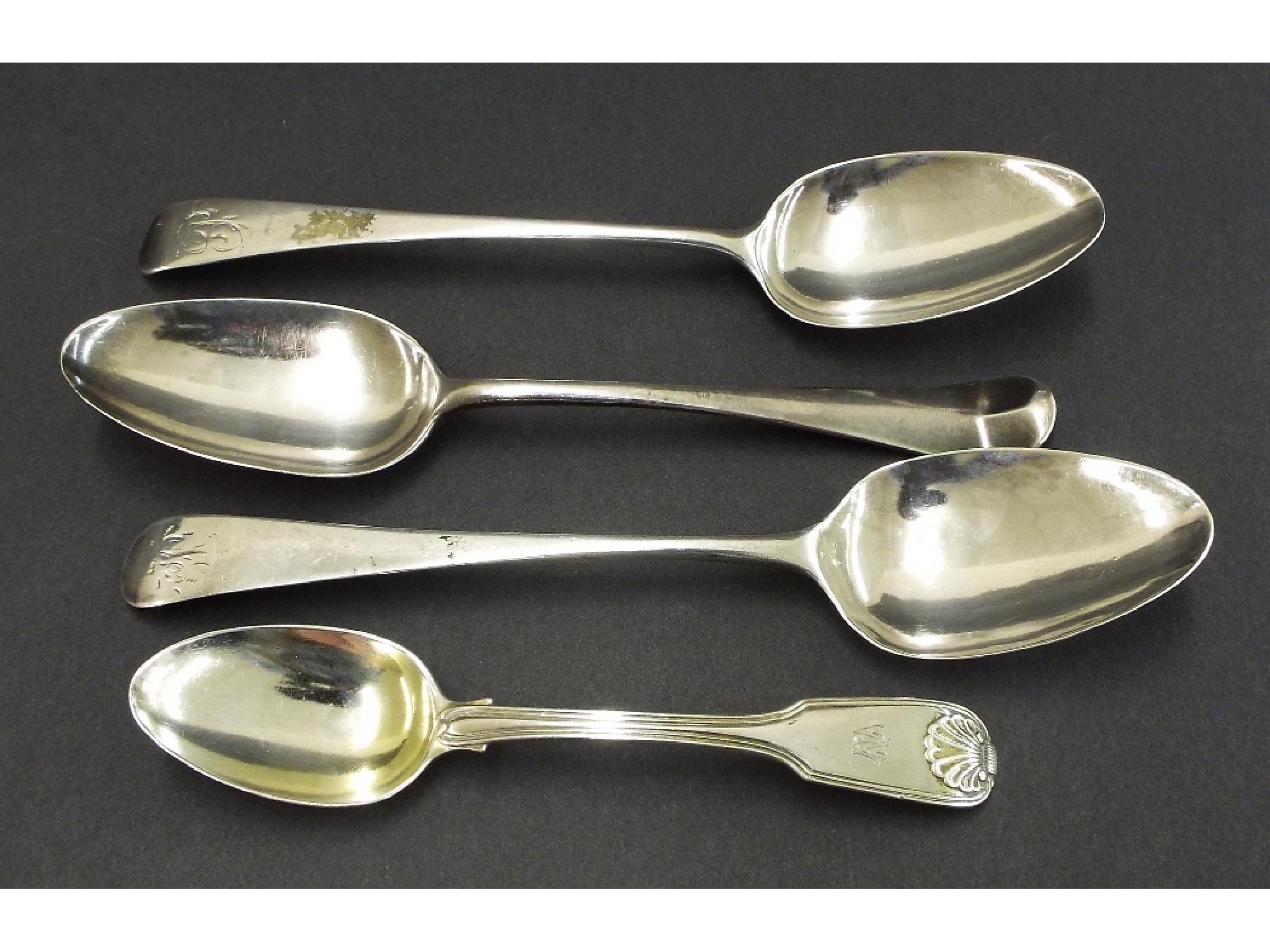 Appraisal: Four Georgian silver spoons to include three table spoons and