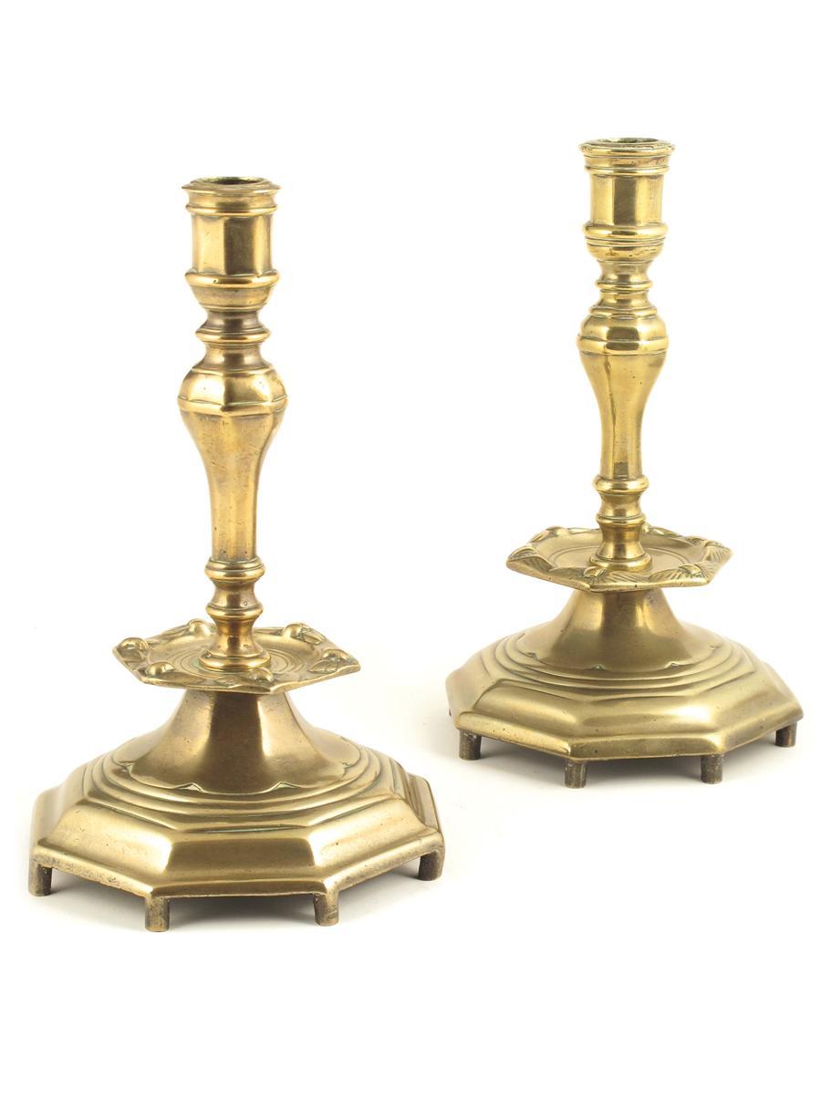 Appraisal: Two th century Flemish polished bronze altar candlesticks