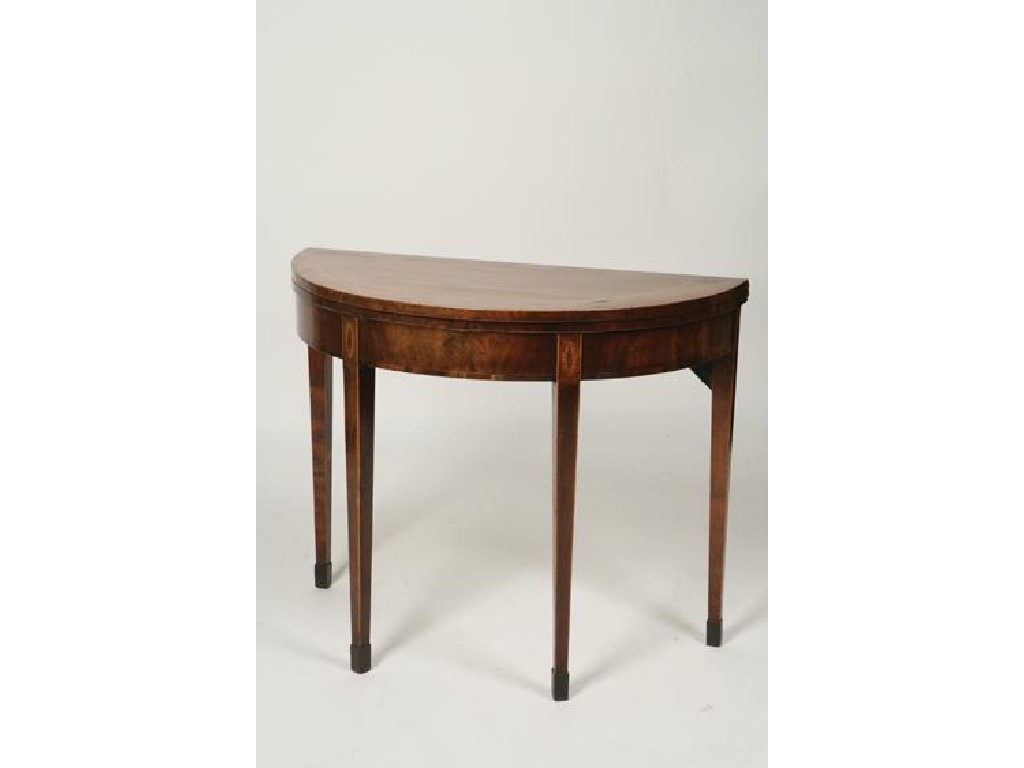 Appraisal: A GEORGE III MAHOGANY CARD TABLE the shaped top with