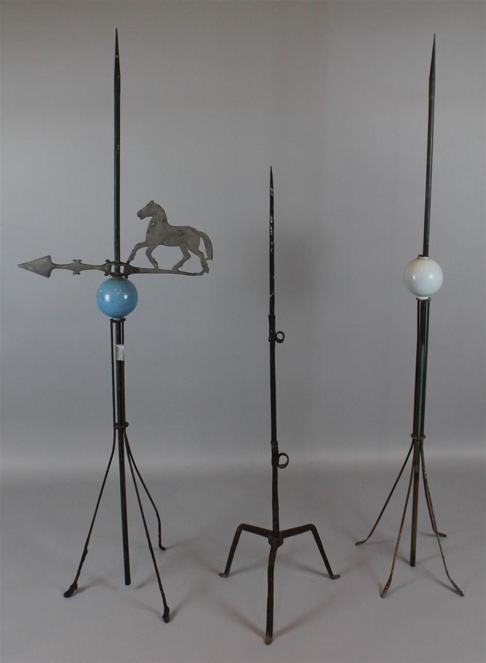 Appraisal: THREE ANTIQUE WEATHERVANES the tallest with white ball raised on