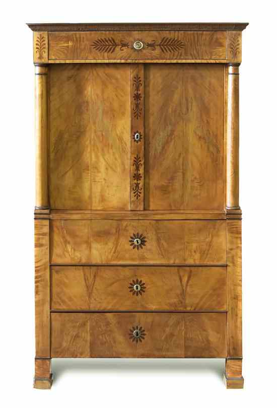 Appraisal: A Biedermeier Satinwood Cabinet the rectangular top over a single