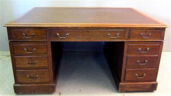 Appraisal: Early th century oak partners desk nine drawer configuration to