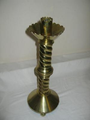 Appraisal: A PAIR OF ARTS AND CRAFTS BRASS CANDLESTICKS with knopped