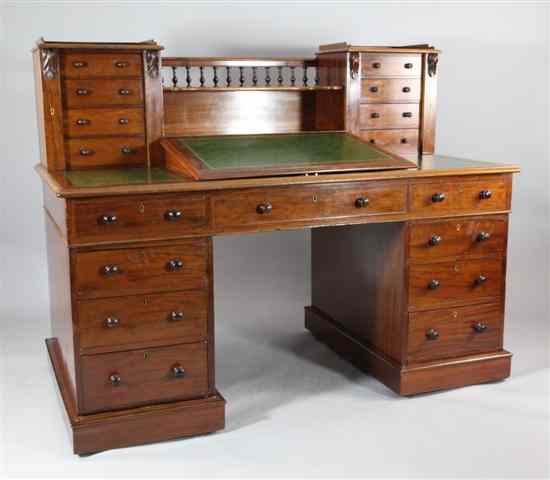 Appraisal: A Victorian mahogany Dickens desk with superstructure of eight drawers