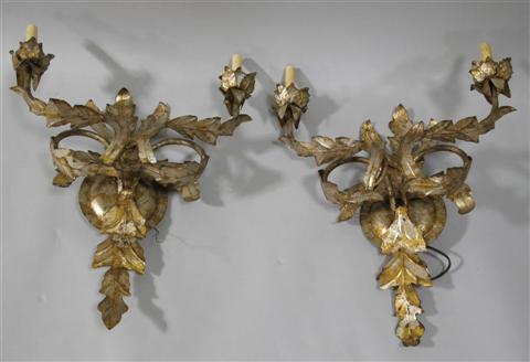 Appraisal: PAIR OF TWO-LIGHT FLORENTINED SCONCES The sconces trimmed all over