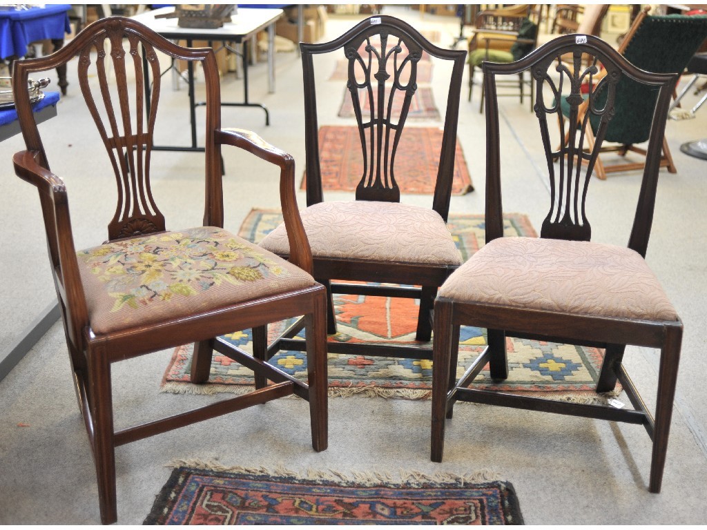 Appraisal: Pair of Edwardian mahogany shield shaped dining chairs and an